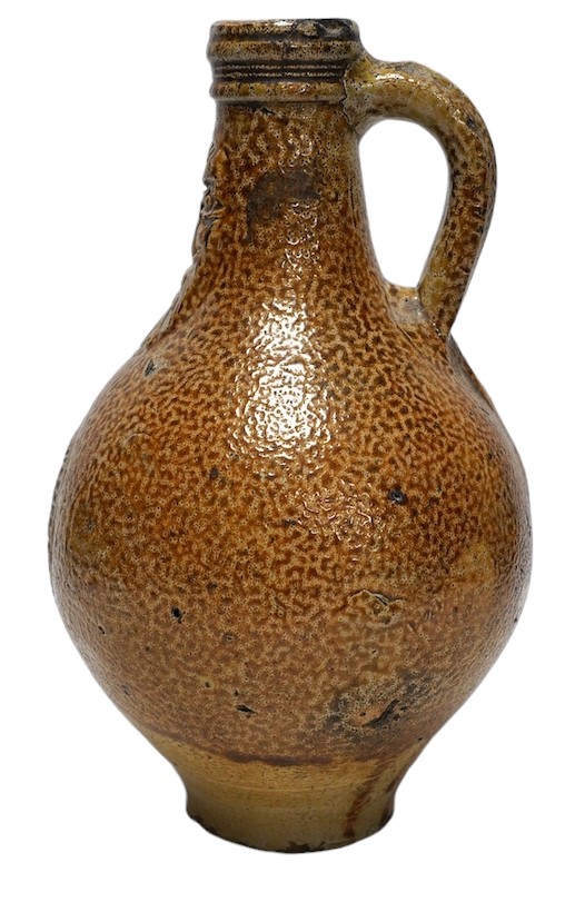 A 17th century Rhenish saltglazed Bellarmine, 23cm. Condition - commensurate with age